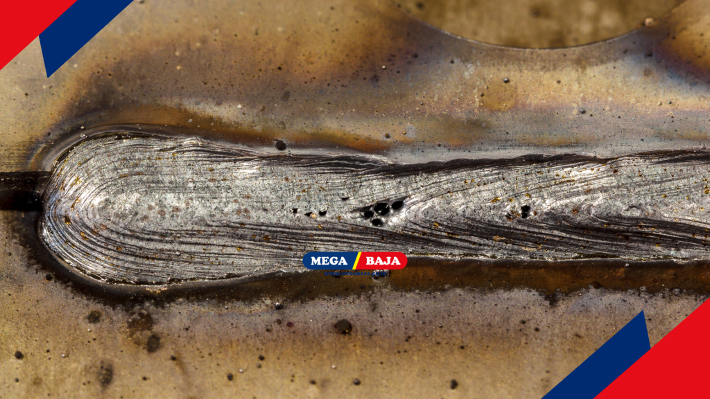 Porosity is a condition where gas is trapped in the weld puddle which solidifies too quickly.